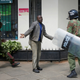 Kenyan policemen beat a protester during clashes in Nairobi on May 16th.